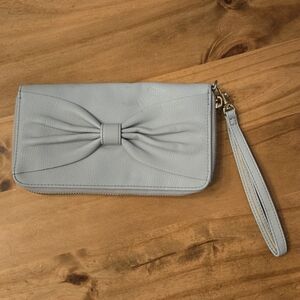 Elegant Blue Clutch with Bow Detail